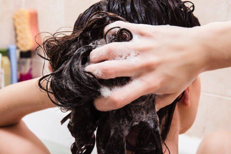 Women avoids dry hair with home water softener system